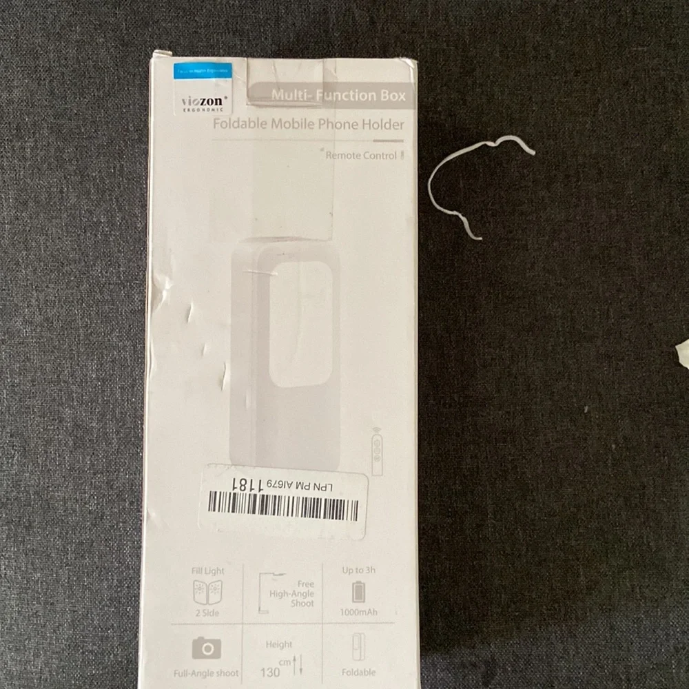 Foldable mobile phone holder